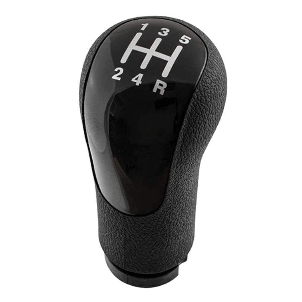 Fekete színű, 5 sebességes Ford váltógomb. Fekete színű üveg számlappal.