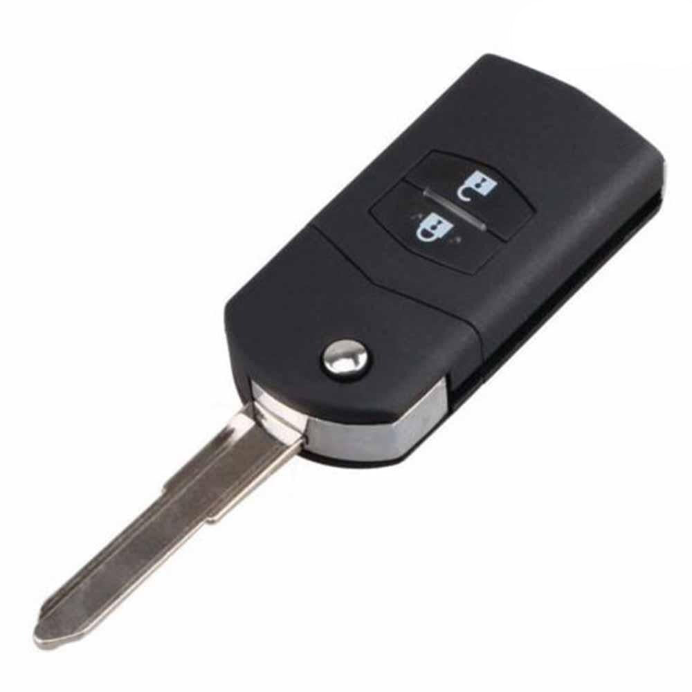 Fekete színű, 2 gombos Mazda bicskakulcs, kulcsház.