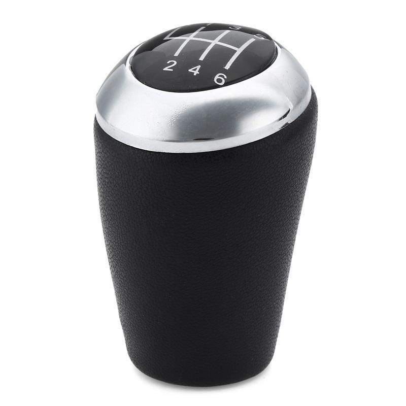 Fekete, 6 sebességes Mazda váltógomb üveg számlappal, króm borítással.