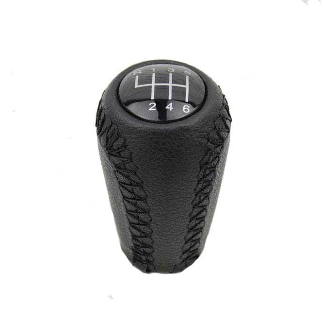 Fekete színű, 6 sebességes bőr Mazda váltógomb. 6 fokozatos üveg számlappal