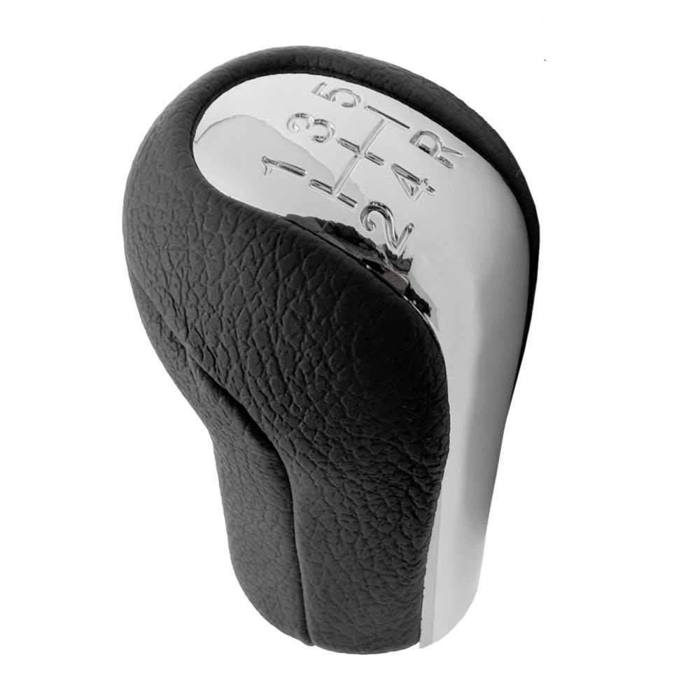 Fekete színű, bőrözött 5 sebességes Toyota váltógomb. Krómozott számlappal.